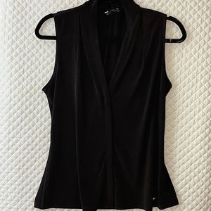 Calvin Klein Black sleeveless blouse. Very versatile. Easy travel wear. Size L
